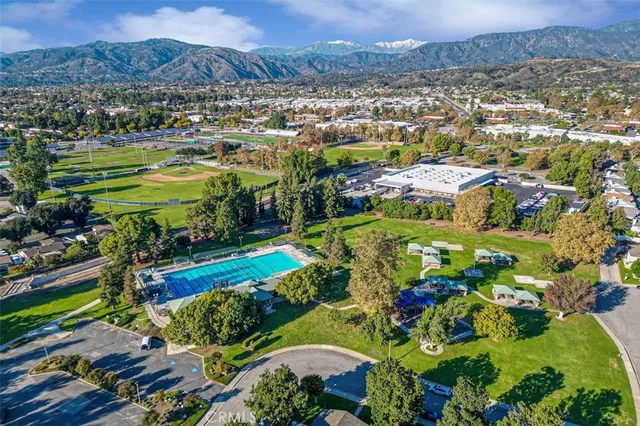 a view of a city with mountains in the background