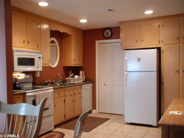 5514 Rollingway Road Chesterfield, VA 23832 - Photo 2 of 12 Kitchen - Large kitchen with lots of storage with flat top stove, microwave, refigerator, dishwasher all new. Ceramic tile floors, and ceiling high hat lighting.