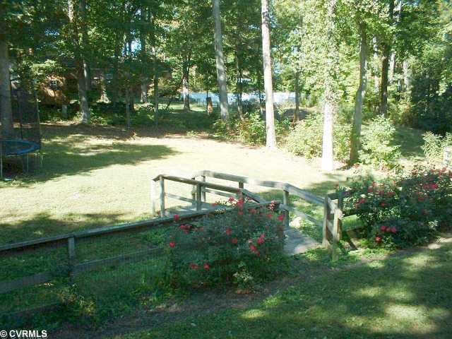 5514 Rollingway Road Chesterfield, VA 23832 - Photo 12 of 12 Yard/Garden - Very large backyard. Great for entertaining, family fun. Rose bushes blooming!
