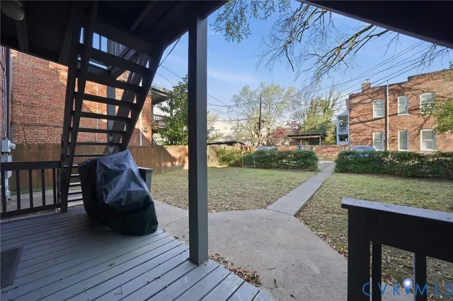 a view of a couches in patio of a house
