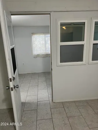 a view of a refrigerator in a kitchen