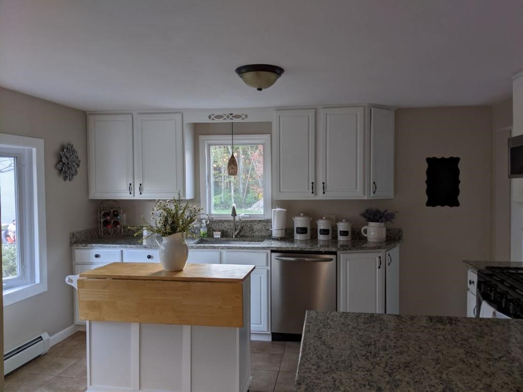 10 Orchard Valley Drive Cranston, RI 02921 - Photo 22 of 31 Kitchen with portable island / granite