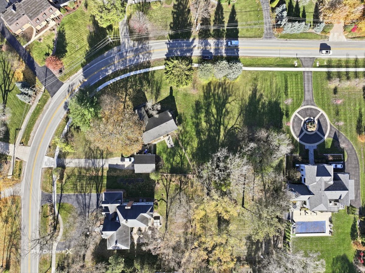 Lot 1 Foothill Drive Wheaton, IL 60189 - Photo 3 of 13 a backyard of a building with table and chairs