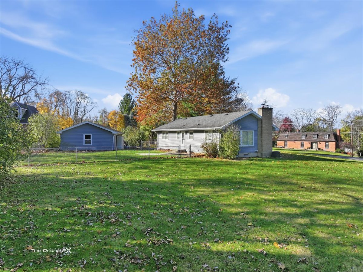 Lot 1 Foothill Drive Wheaton, IL 60189 - Photo 7 of 13 a view of a house with a big yard and large trees