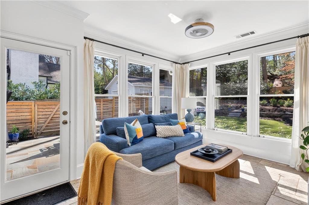 1197 Beech Valley Road Northeast Atlanta, GA 30306 - Photo 15 of 31 a living room with furniture and a large window