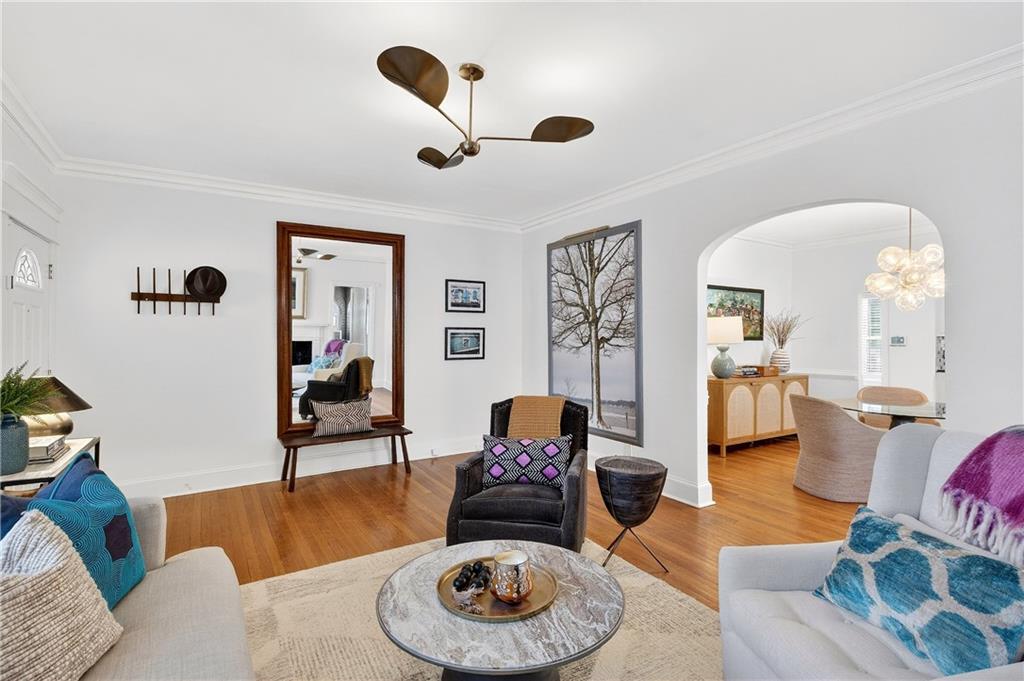 1197 Beech Valley Road Northeast Atlanta, GA 30306 - Photo 3 of 31 a living room with furniture and a wooden floor