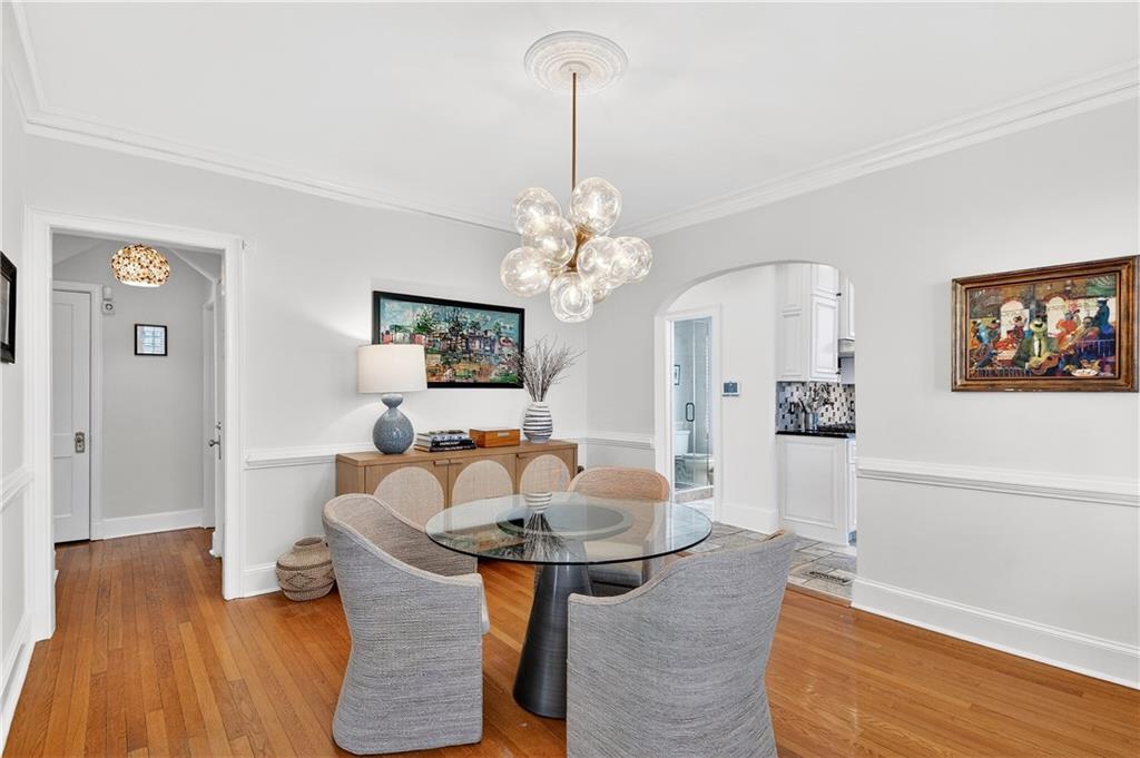 1197 Beech Valley Road Northeast Atlanta, GA 30306 - Photo 8 of 31 a living room with furniture and a wooden floor