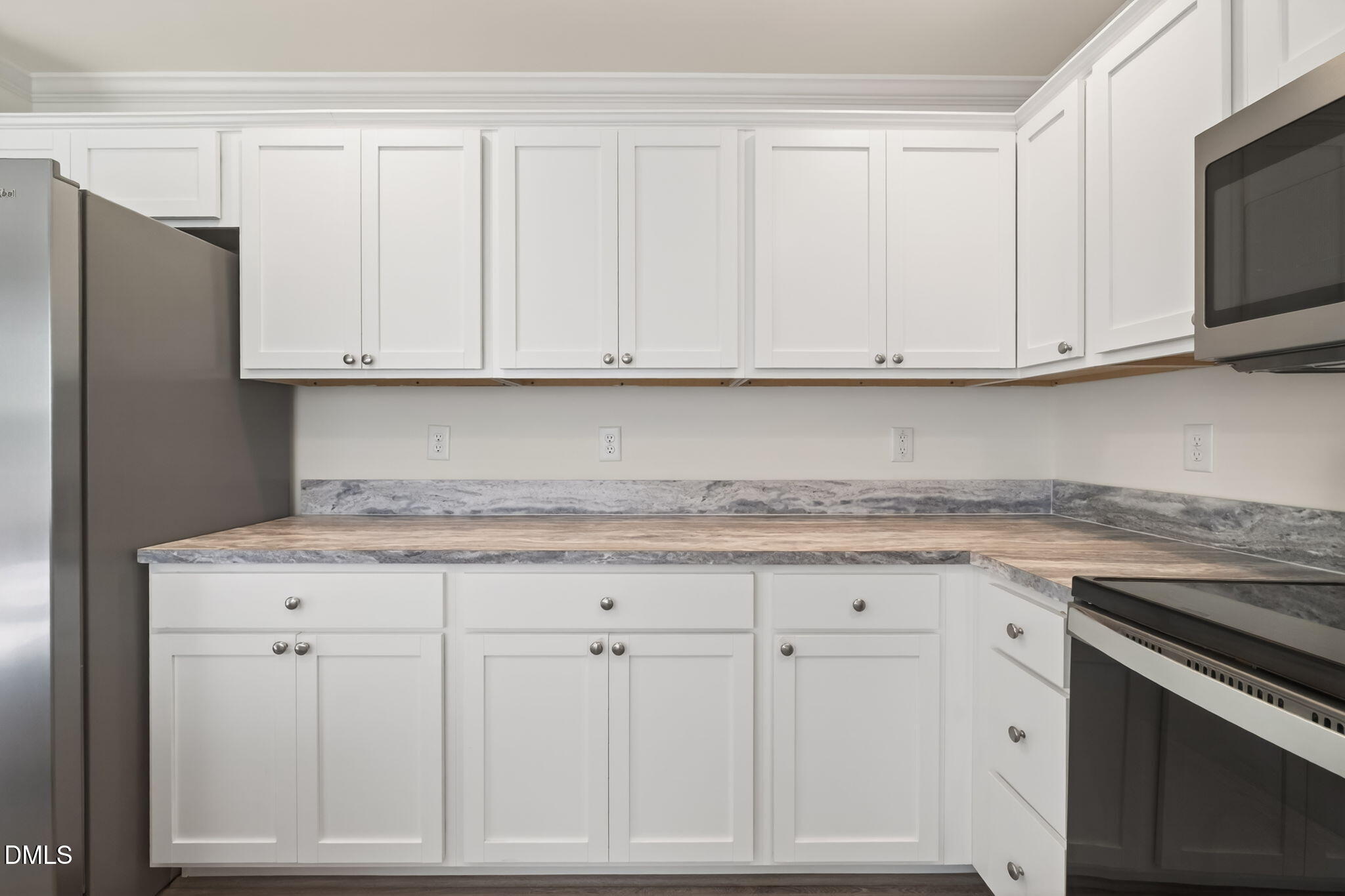 7122 Guess Road Hillsborough, NC 27278 - Photo 10 of 48 a kitchen with granite countertop white cabinets and sink