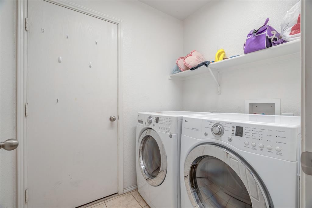 3216 Jetranger Road Fort Worth, TX 76053 - Photo 24 of 35 Laundry room with light tile patterned floors and independent washer and dryer