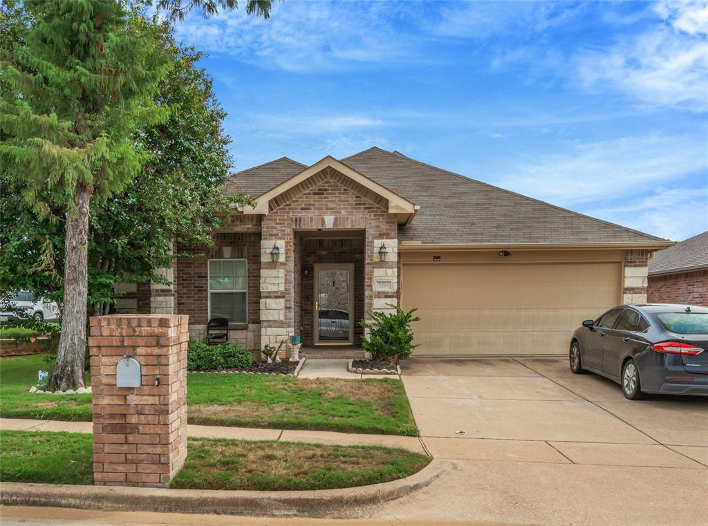 3216 Jetranger Road Fort Worth, TX 76053 - Photo 3 of 35 View of front of home featuring brick siding, driveway, and a shingled roof