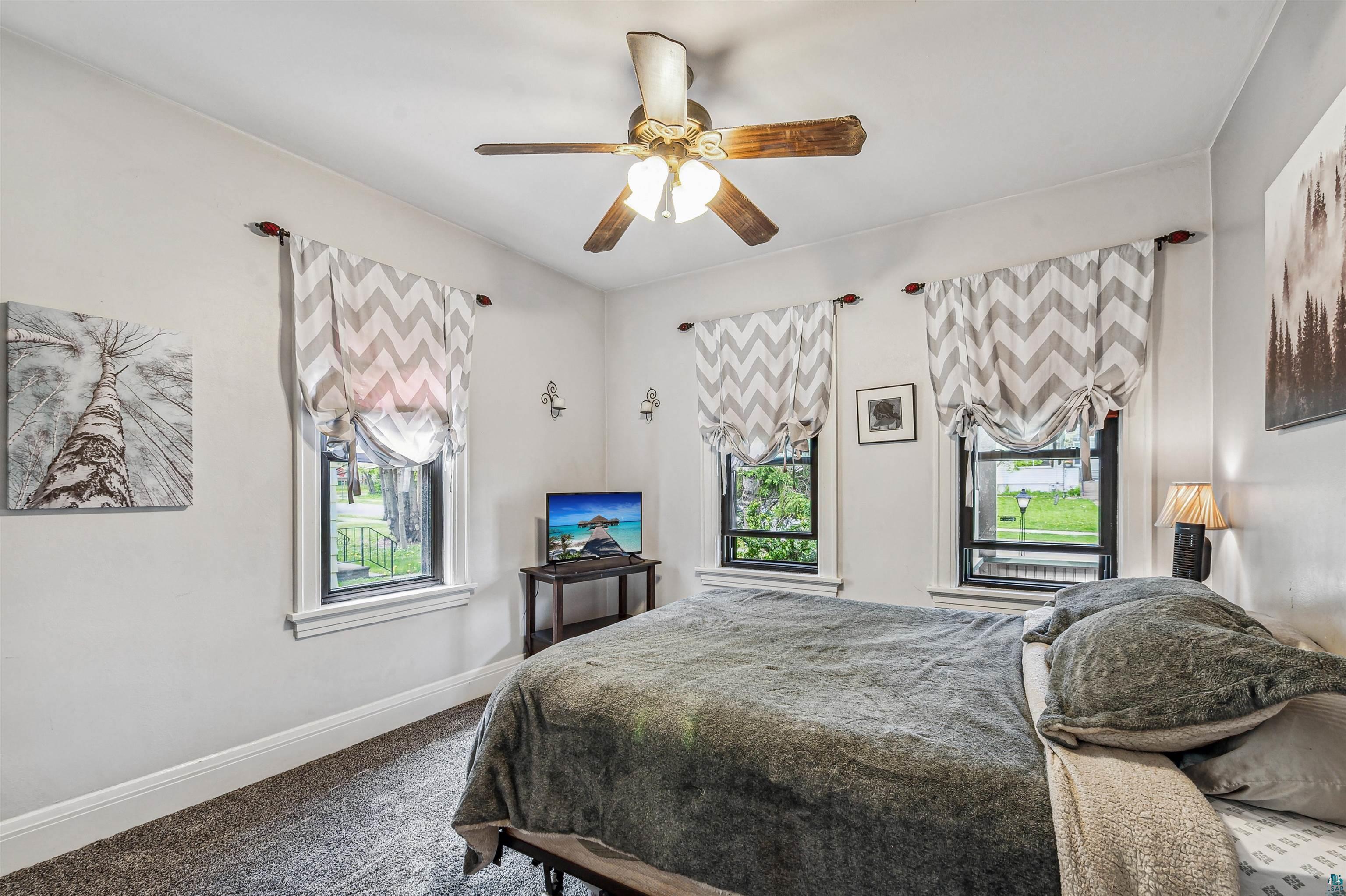 4516 Gladstone Street Duluth, MN 55804 - Photo 7 of 20 Bedroom with carpet and ceiling fan