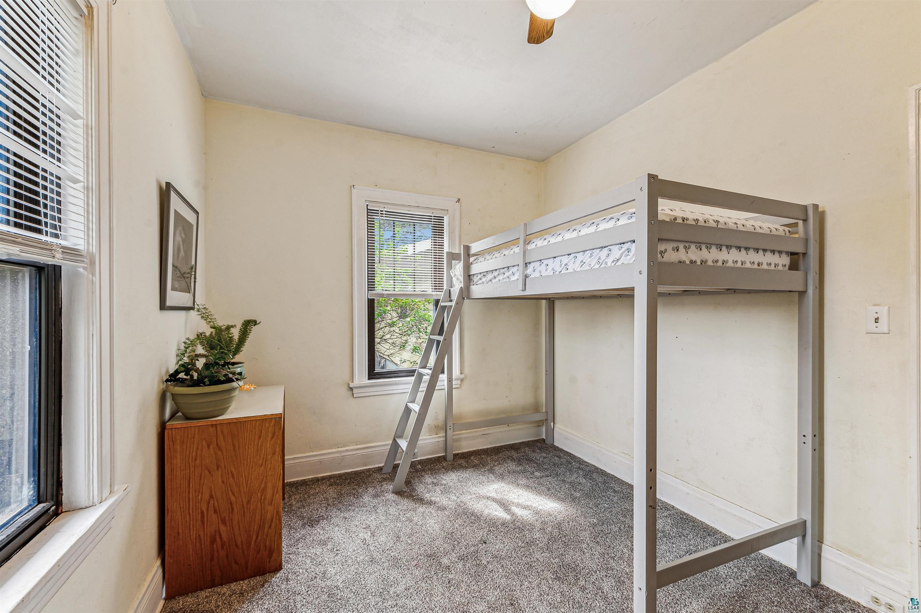 4516 Gladstone Street Duluth, MN 55804 - Photo 9 of 20 Carpeted bedroom featuring ceiling fan