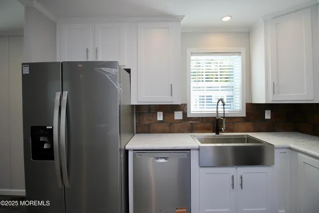 a kitchen with a stove and a microwave