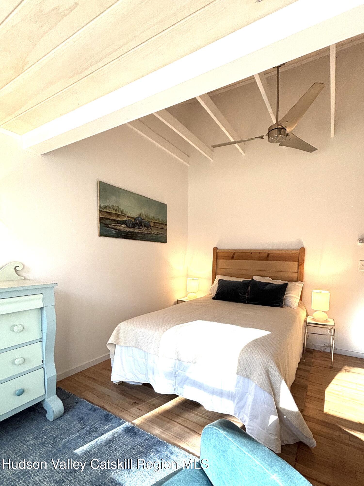 299 Wittenberg Road Woodstock, NY 12409 - Photo 21 of 49 a bedroom with a bed and a dresser