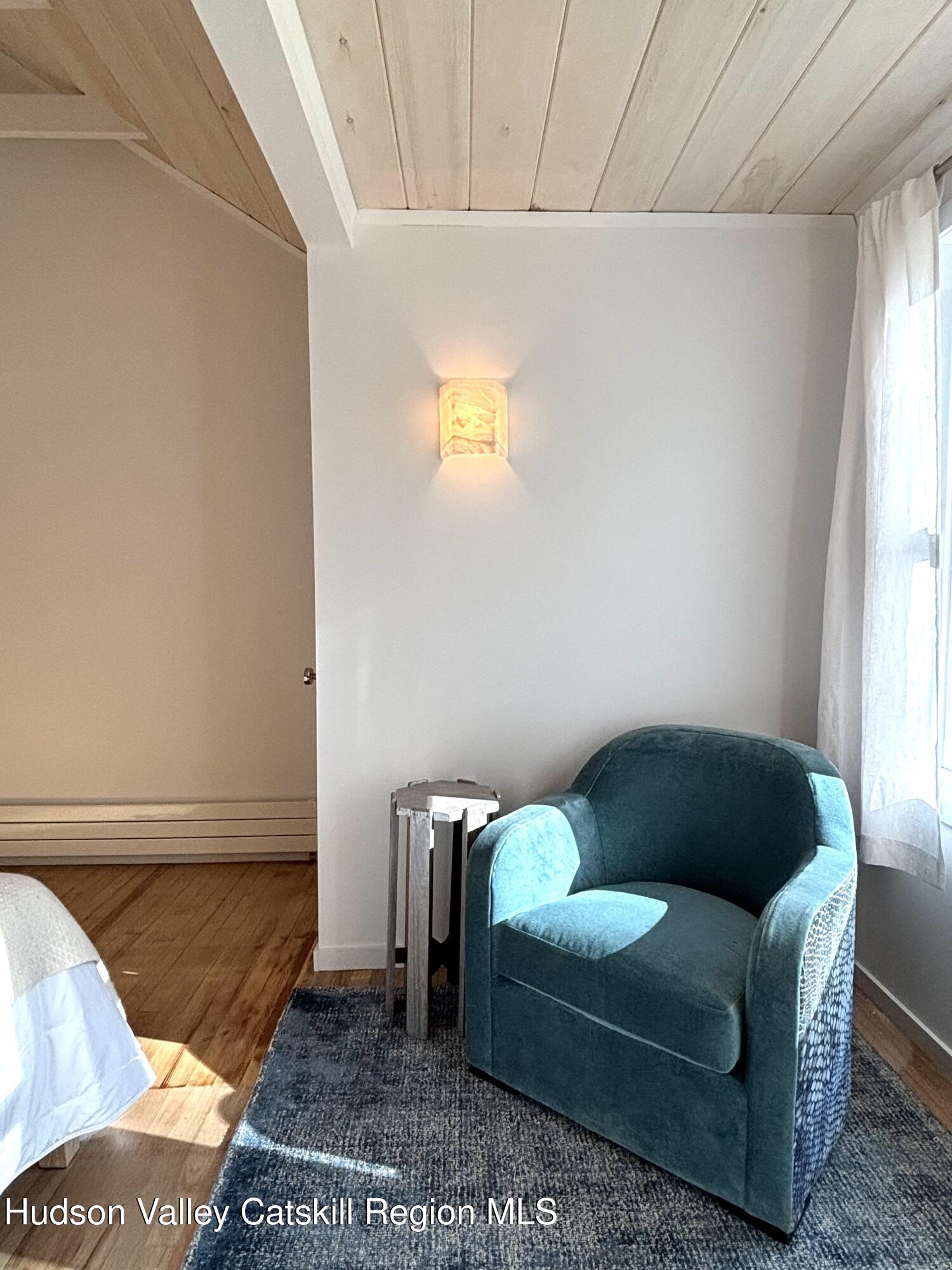 299 Wittenberg Road Woodstock, NY 12409 - Photo 23 of 49 a living room with furniture and a window