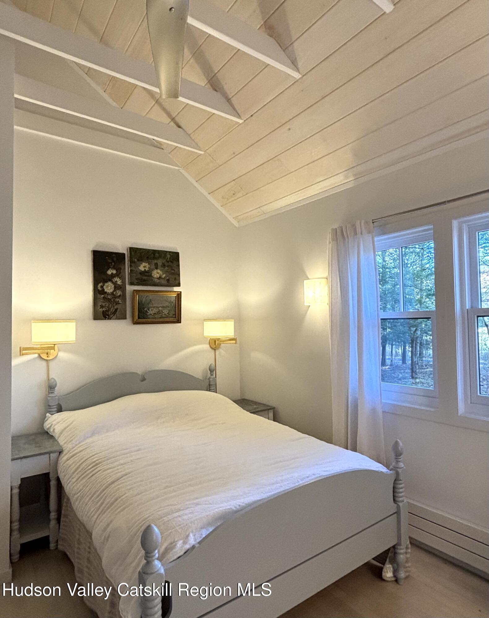 299 Wittenberg Road Woodstock, NY 12409 - Photo 29 of 49 a bedroom with a bed and a window