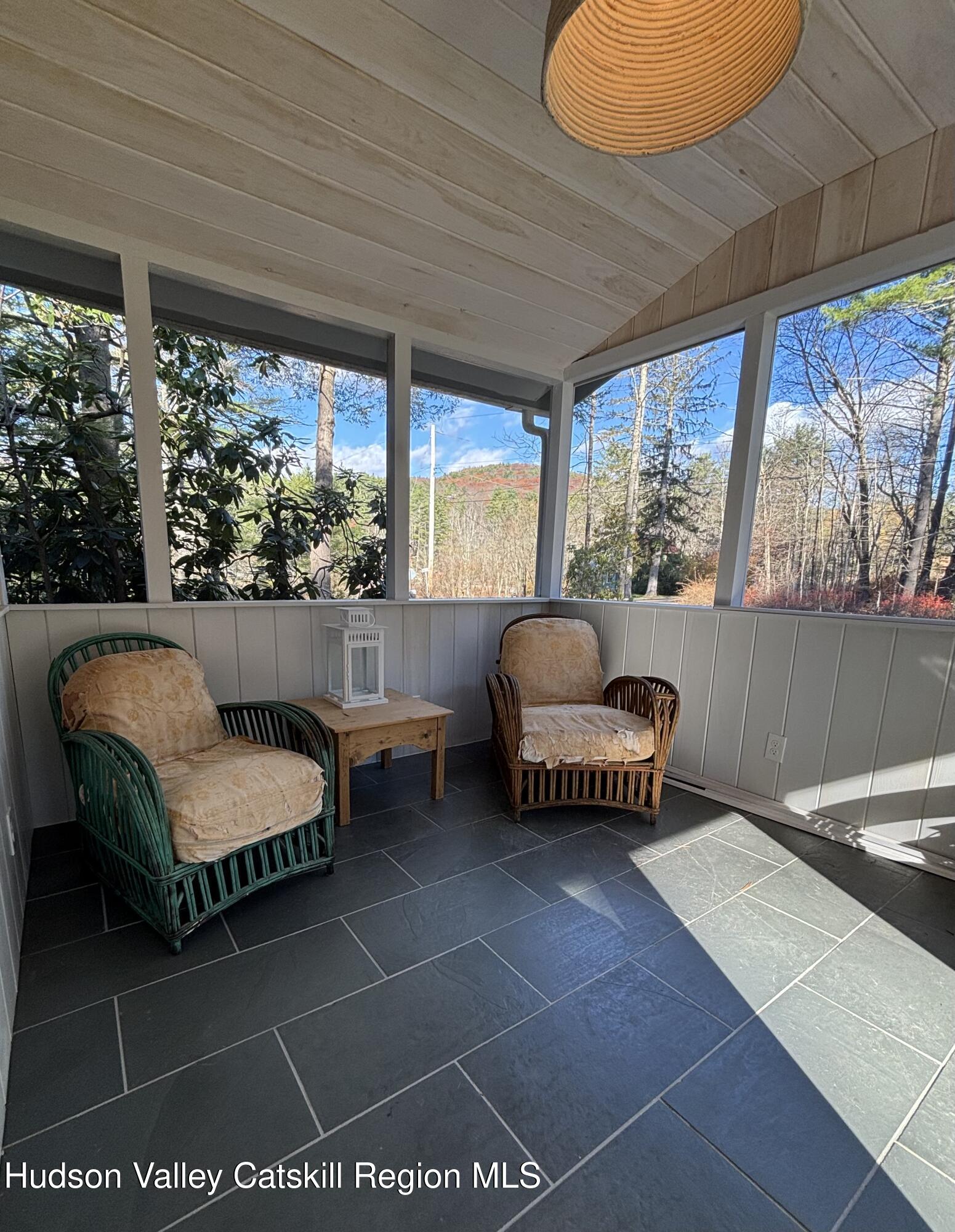 299 Wittenberg Road Woodstock, NY 12409 - Photo 4 of 49 a living room with furniture and a large window