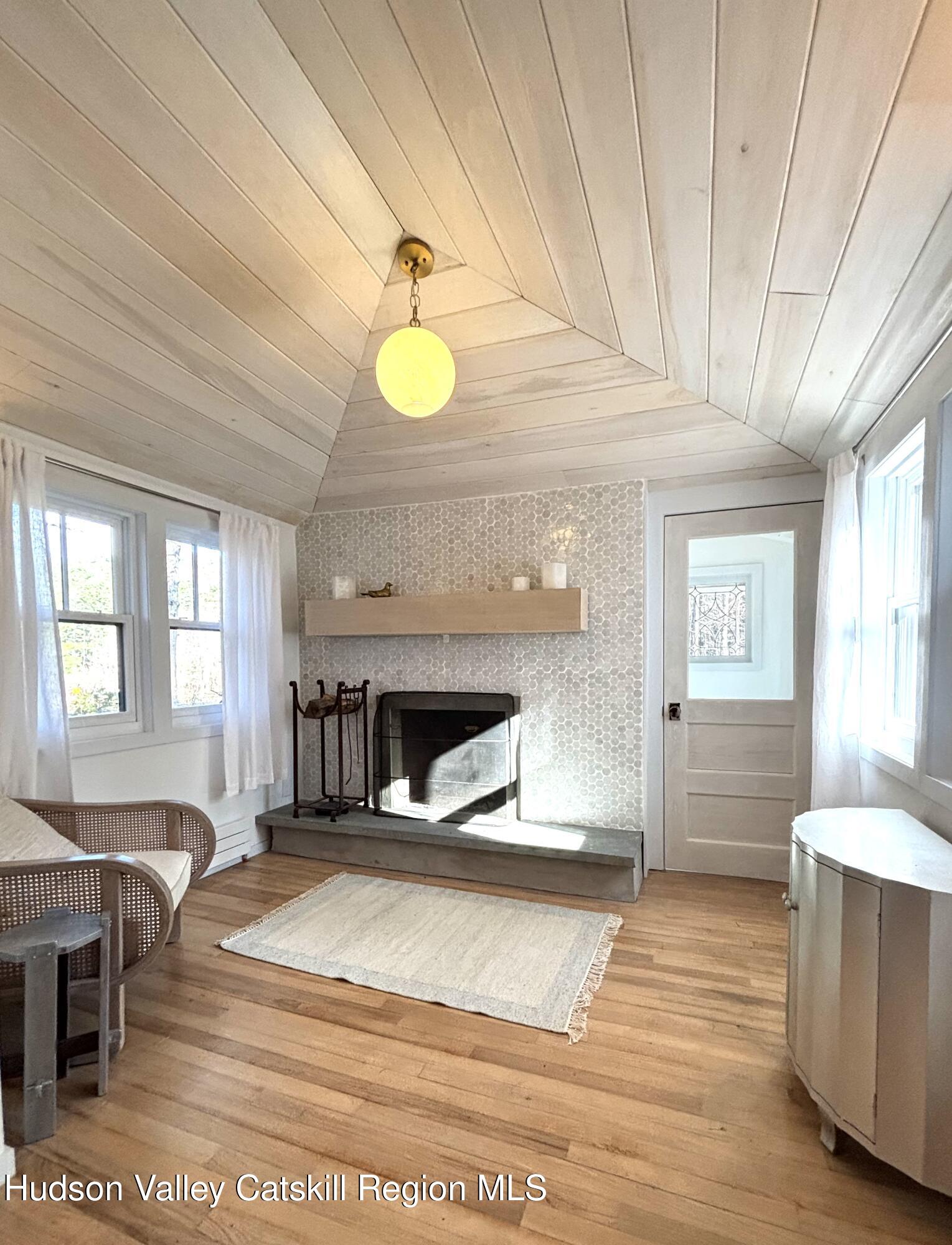 299 Wittenberg Road Woodstock, NY 12409 - Photo 6 of 49 a view of a kitchen with granite countertop a sink cabinets and window