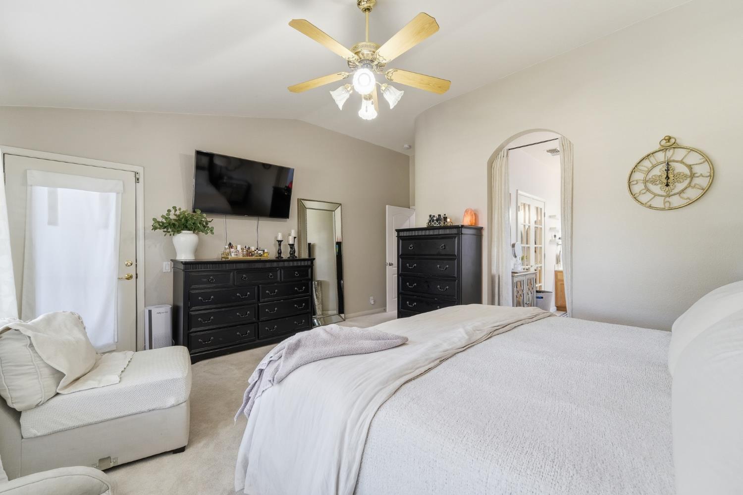 2220 Ellison Drive Modesto, CA 95355 - Photo 24 of 53 a bedroom with a bed and a television