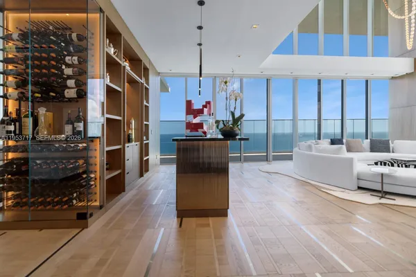 a view of a living room with a flat screen tv