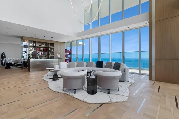 a kitchen with stainless steel appliances wooden cabinets and a stove top oven