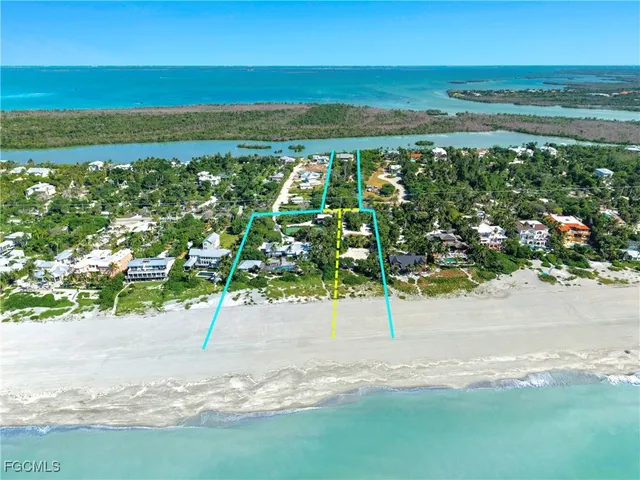 a view of a yard with an ocean view