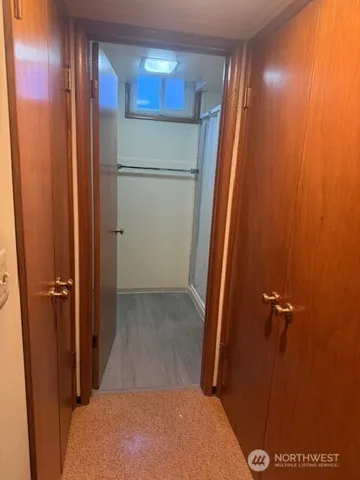 a bathroom with a shower and a sink