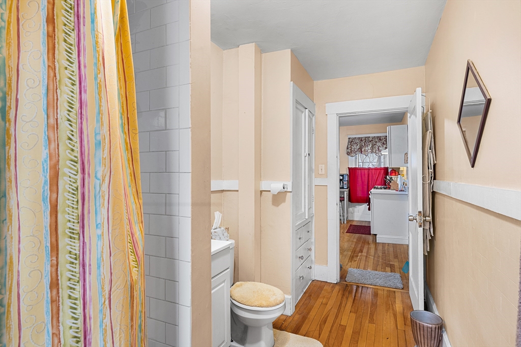 748 Water Street Fitchburg, MA 01420 - Photo 12 of 39 a bathroom with a sink and a mirror