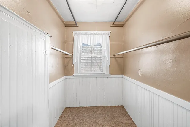 a view of empty room with windows