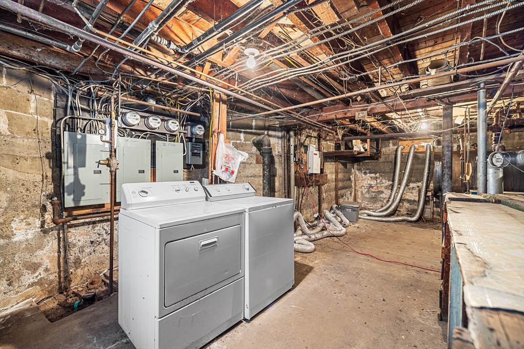 748 Water Street Fitchburg, MA 01420 - Photo 37 of 39 a utility room with dryer and washer