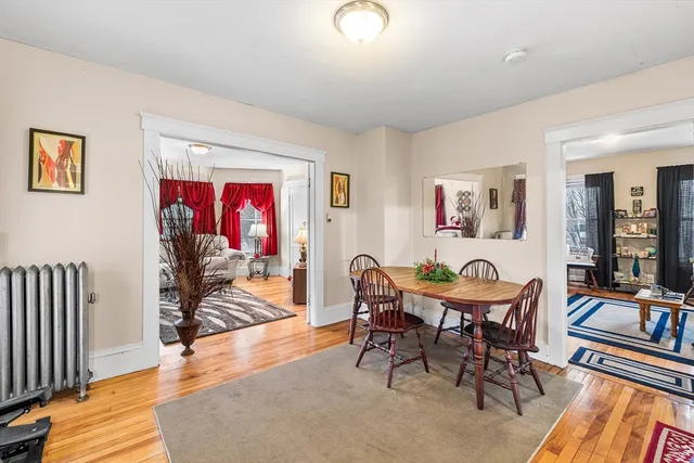 a view of a livingroom with furniture and wooden floor