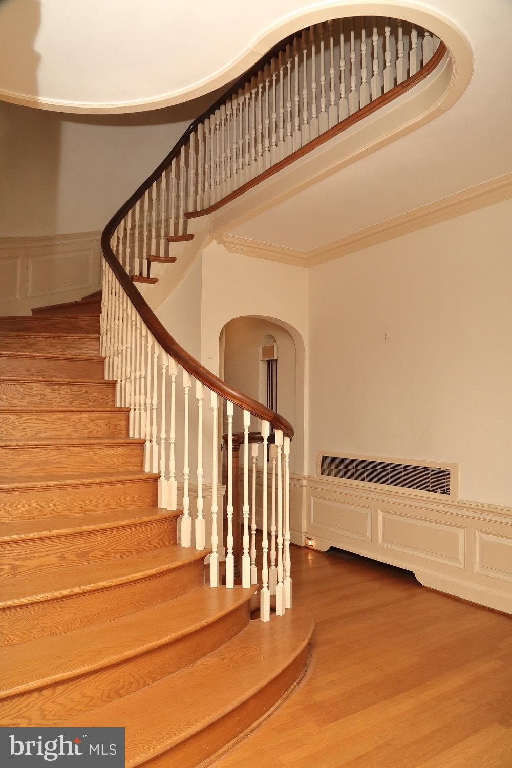 1105 Windsor Road Red Lion, PA 17356 - Photo 5 of 70 Curves of one-of-a-kind stairway mirrored in foyer