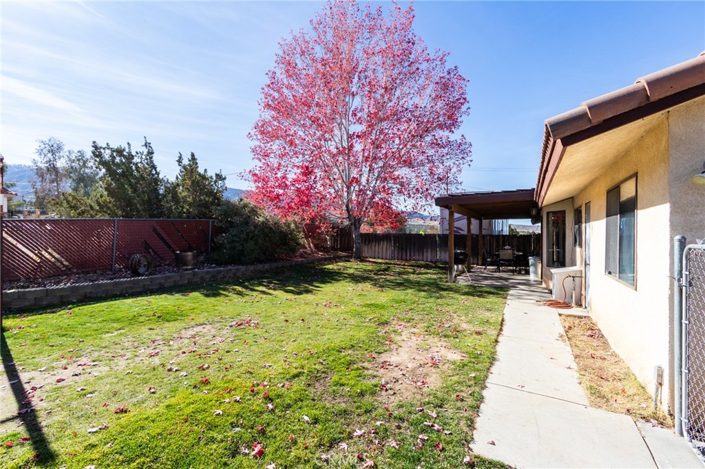 10163 Ponderosa Road Pinon Hills, CA 92372 - Photo 23 of 35 a view of a swimming pool with sitting area