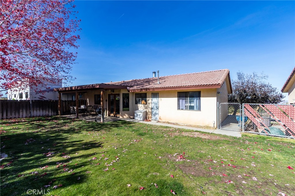 10163 Ponderosa Road Pinon Hills, CA 92372 - Photo 24 of 35 a view of a house with backyard