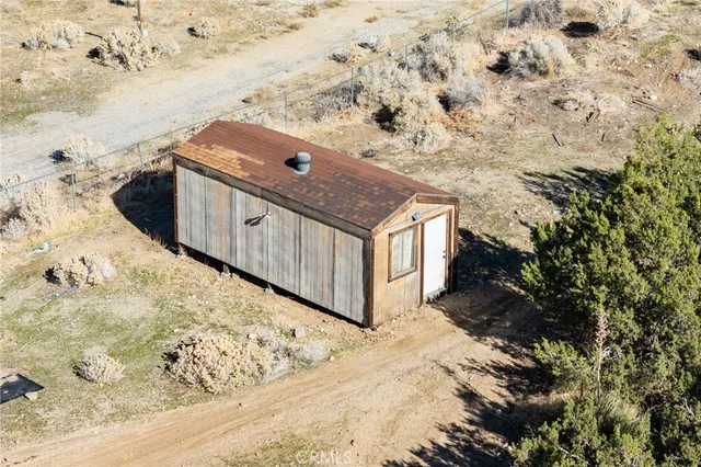 a view of a yard with an outdoor space