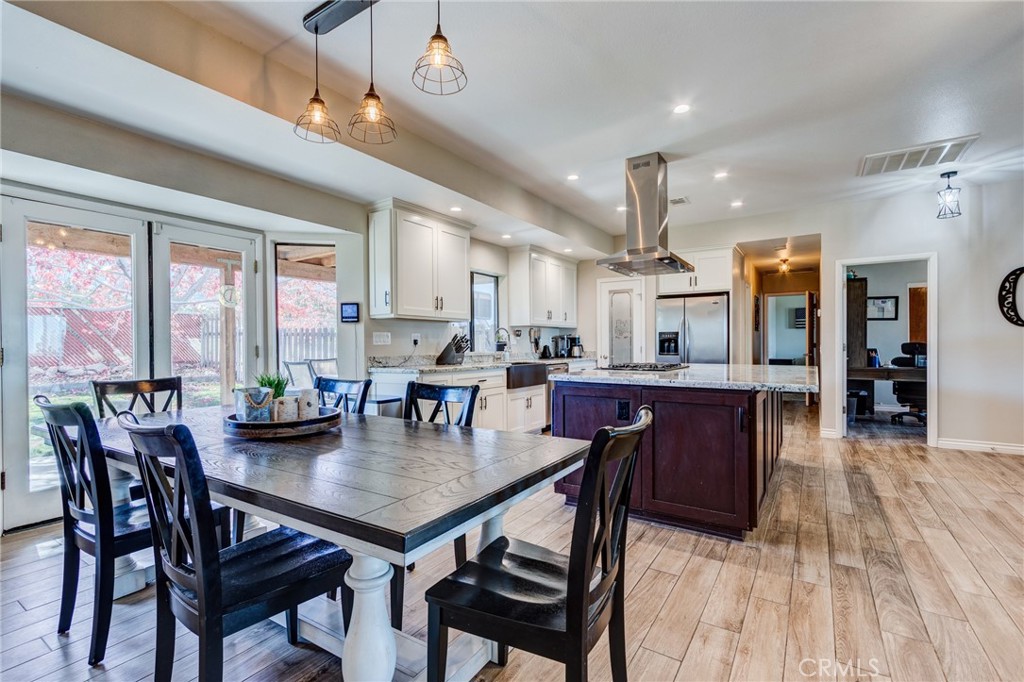 10163 Ponderosa Road Pinon Hills, CA 92372 - Photo 6 of 35 a view of a dining room with furniture and window