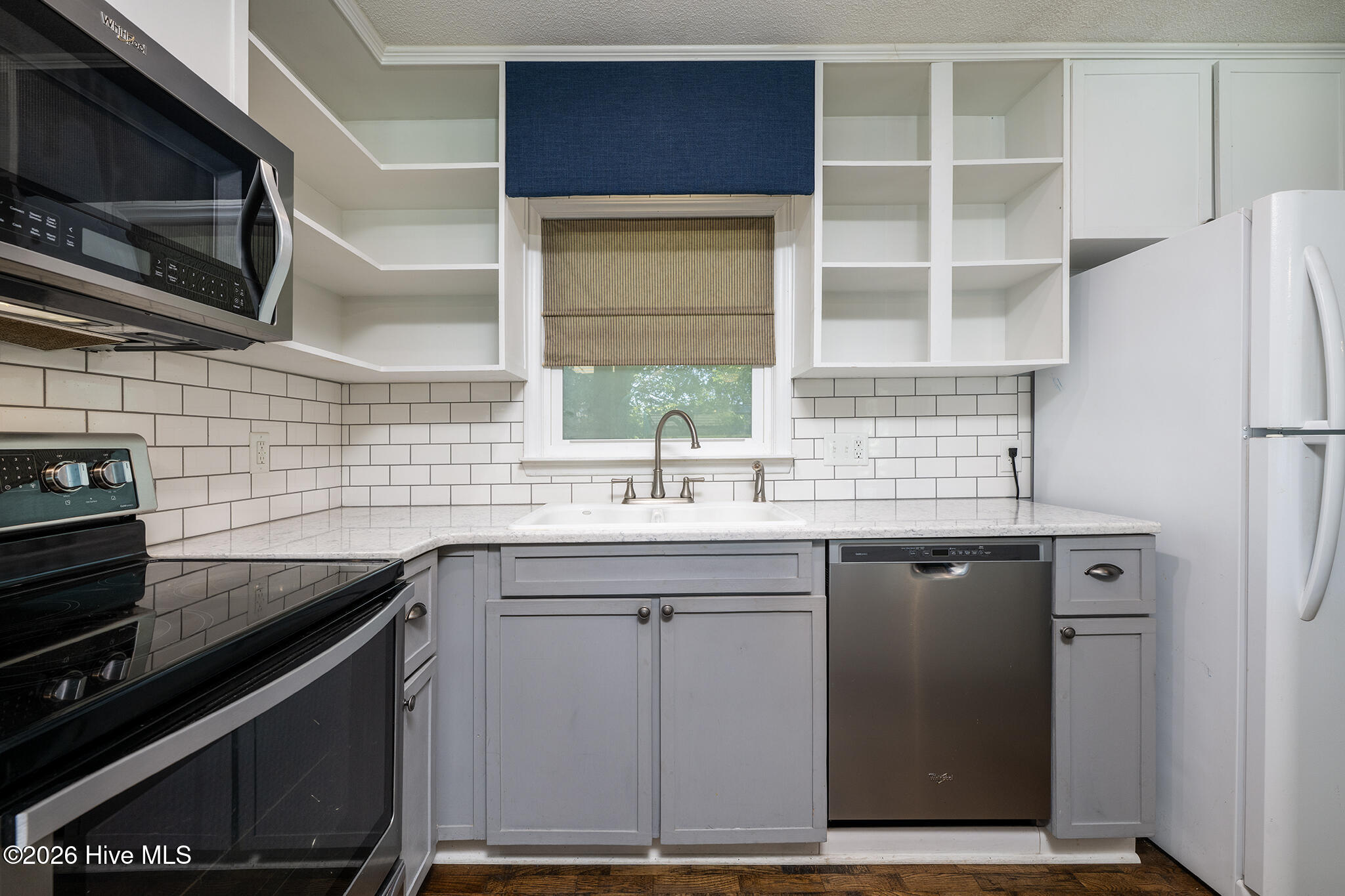 116 Barden Drive Havelock, NC 28532 - Photo 13 of 45 Stainless Steel Appliances and White Refrigerator