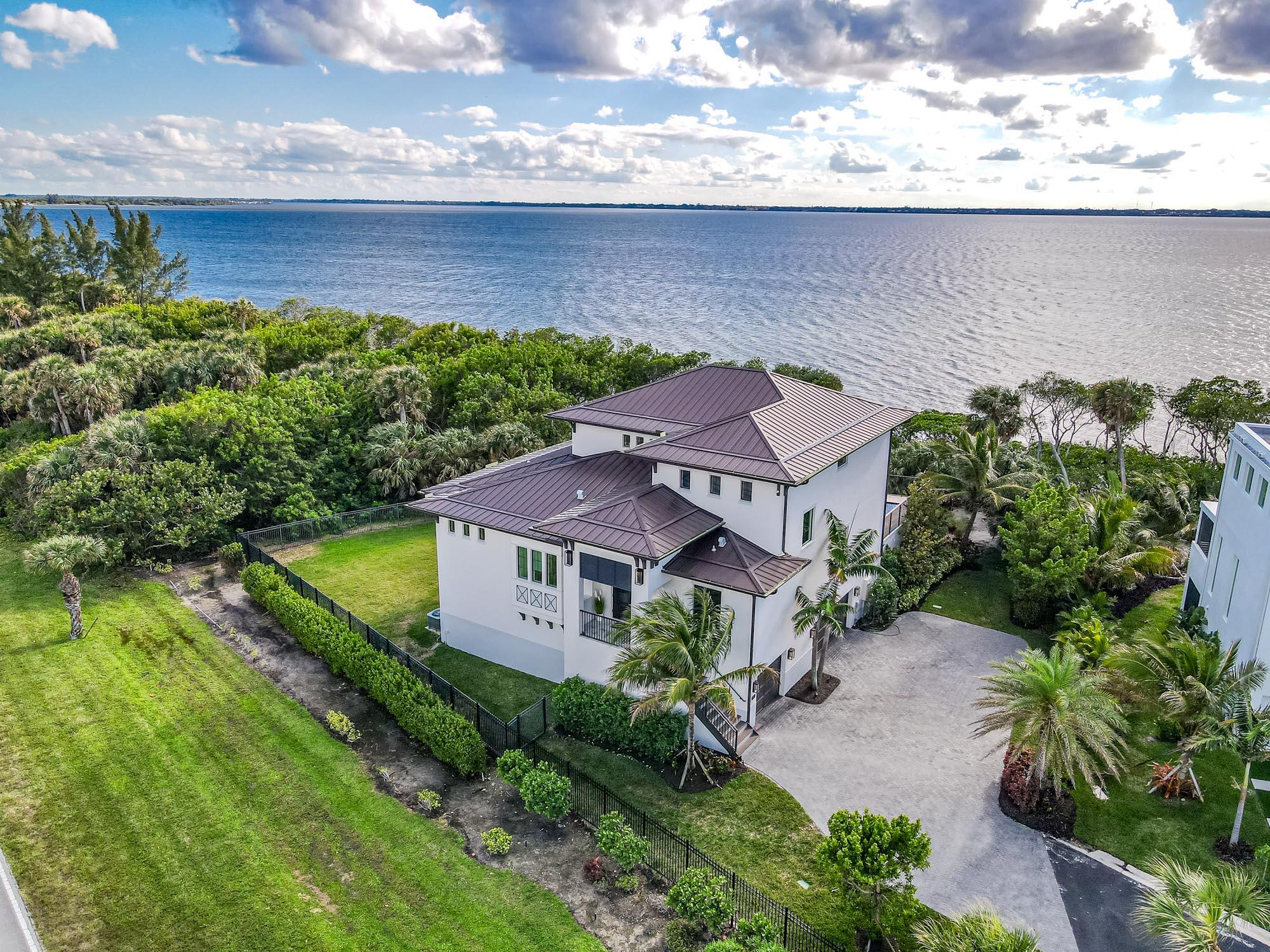 an aerial view of a house with a garden