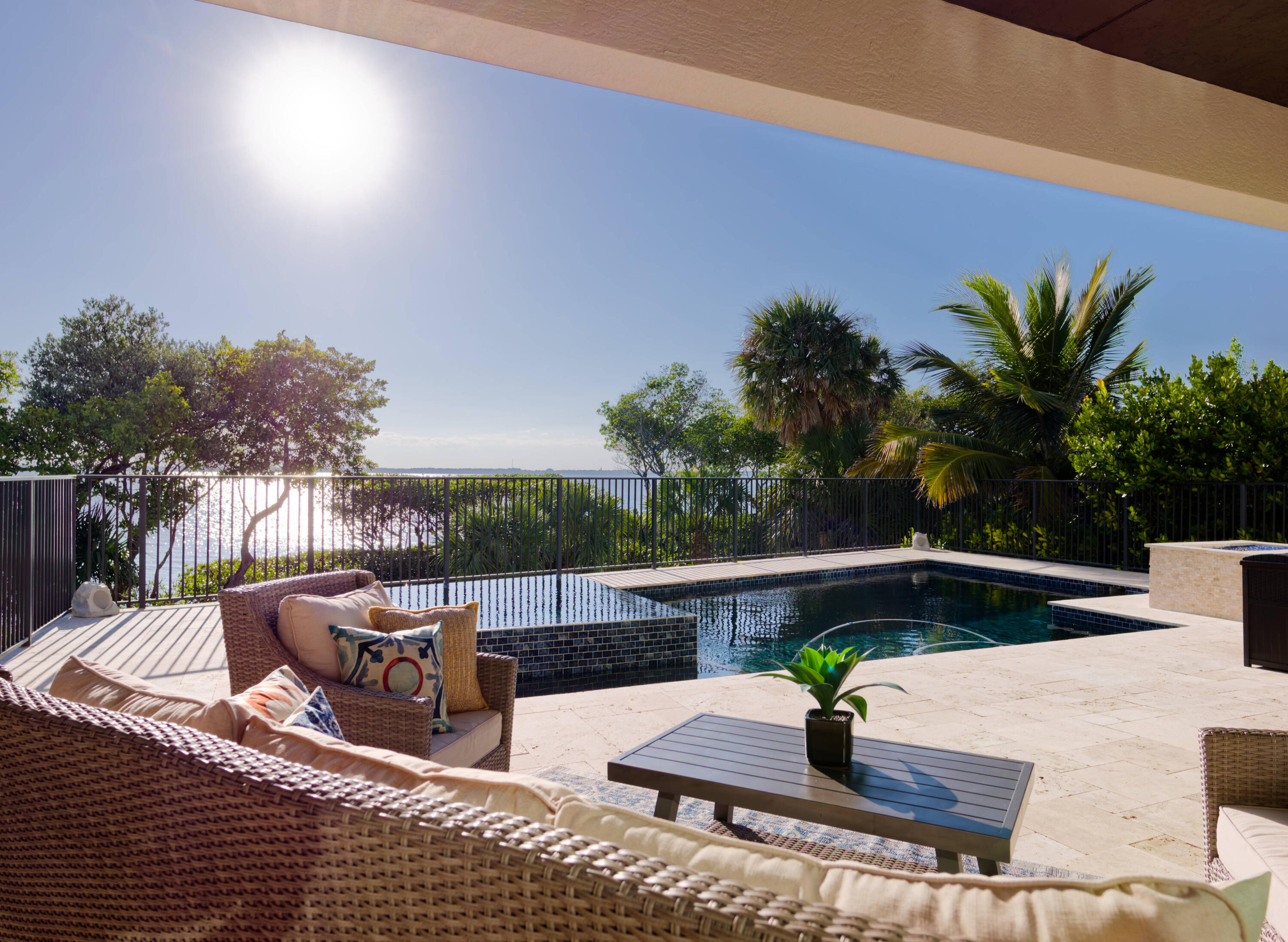 7683 Pelican Pointe Drive Jensen Beach, FL 34957 - Photo 11 of 40 a view of a backyard with sitting area
