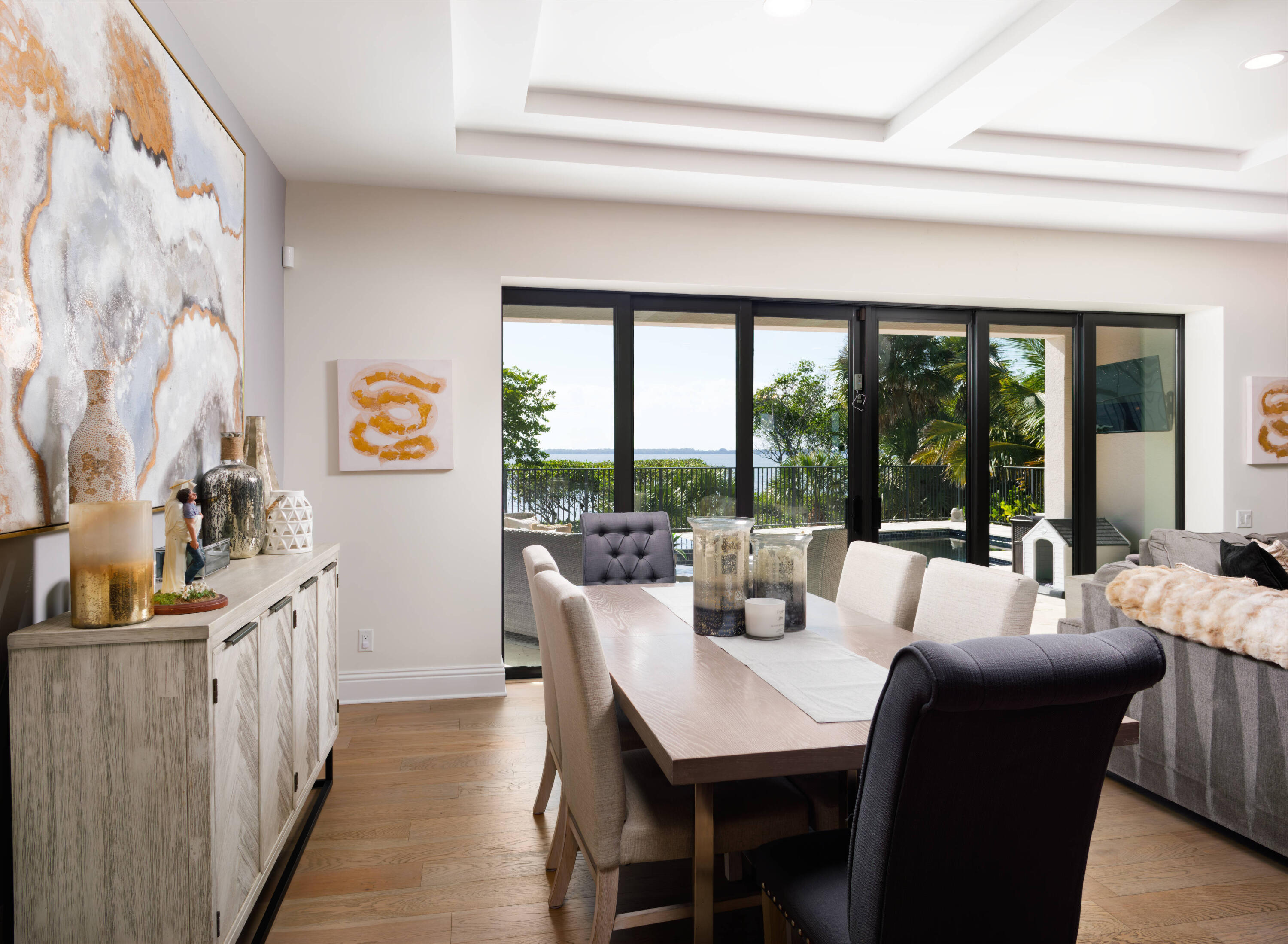 7683 Pelican Pointe Drive Jensen Beach, FL 34957 - Photo 13 of 40 a living room with furniture and a large window