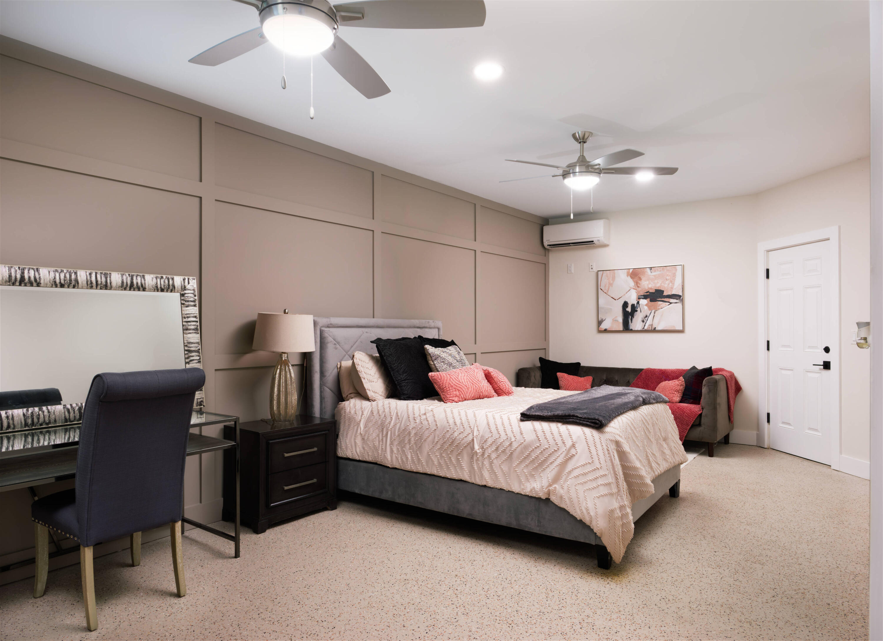 7683 Pelican Pointe Drive Jensen Beach, FL 34957 - Photo 24 of 40 a bedroom with a bed dresser and a chair