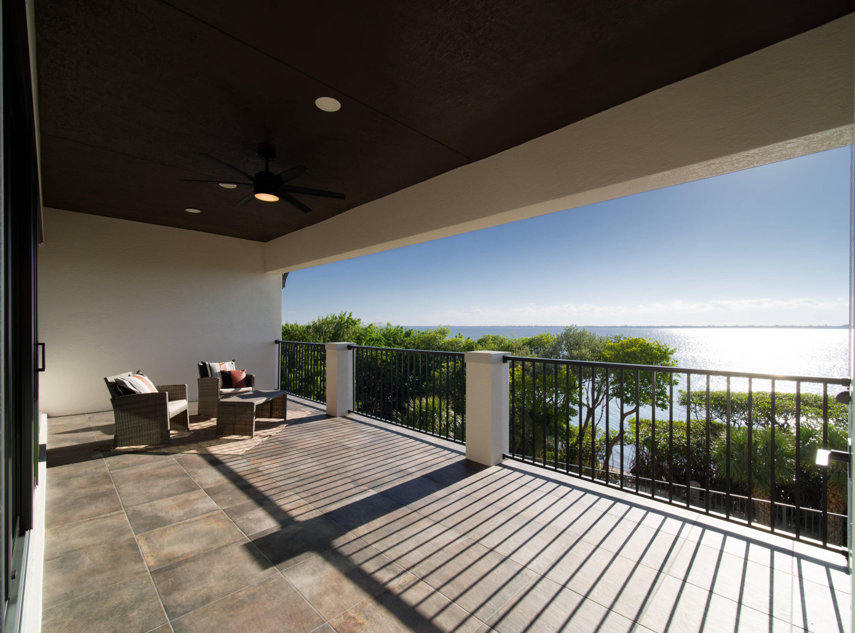 7683 Pelican Pointe Drive Jensen Beach, FL 34957 - Photo 27 of 40 a view of a balcony with chairs