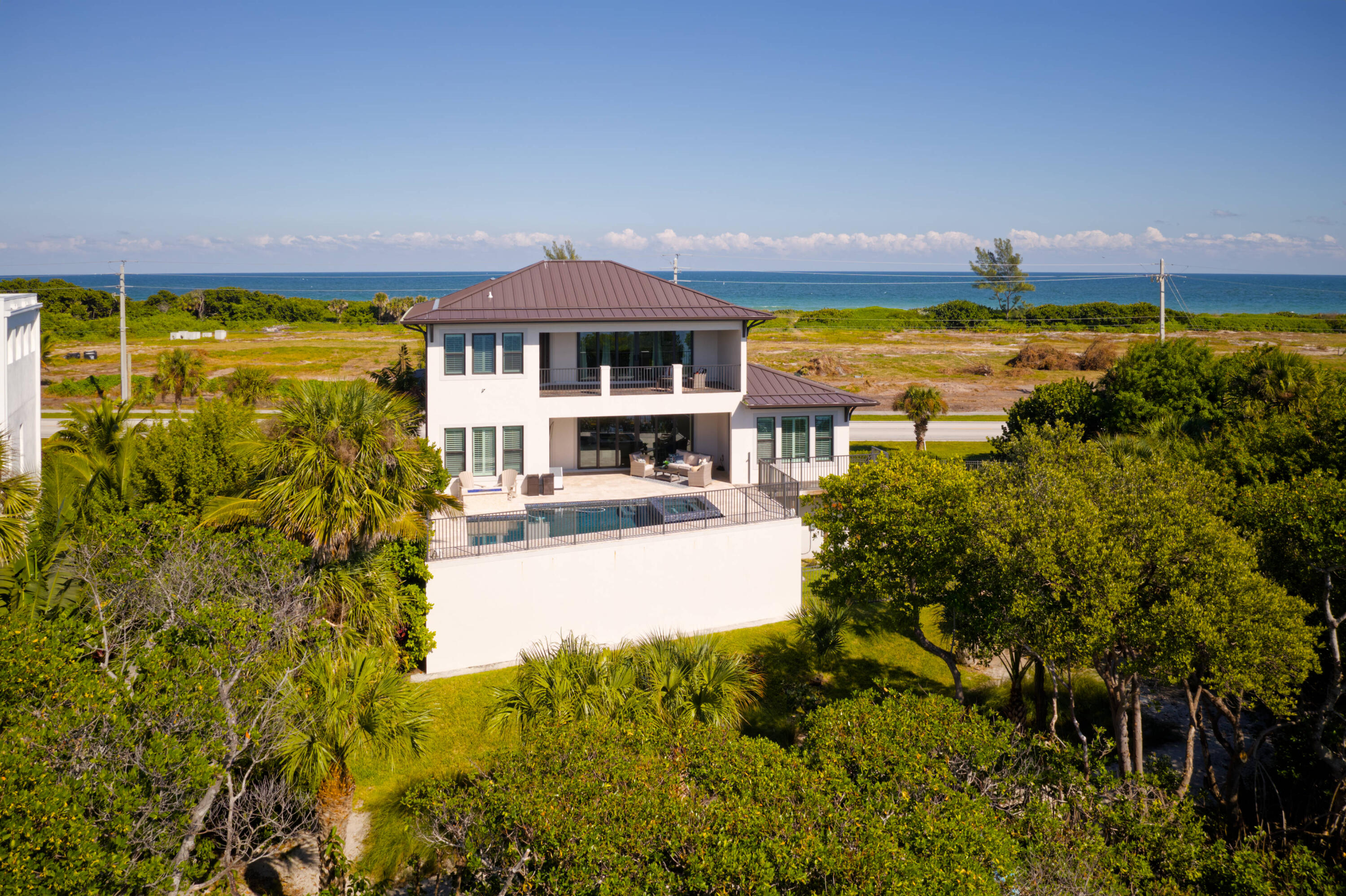 7683 Pelican Pointe Drive Jensen Beach, FL 34957 - Photo 36 of 40 a view of a house with a yard