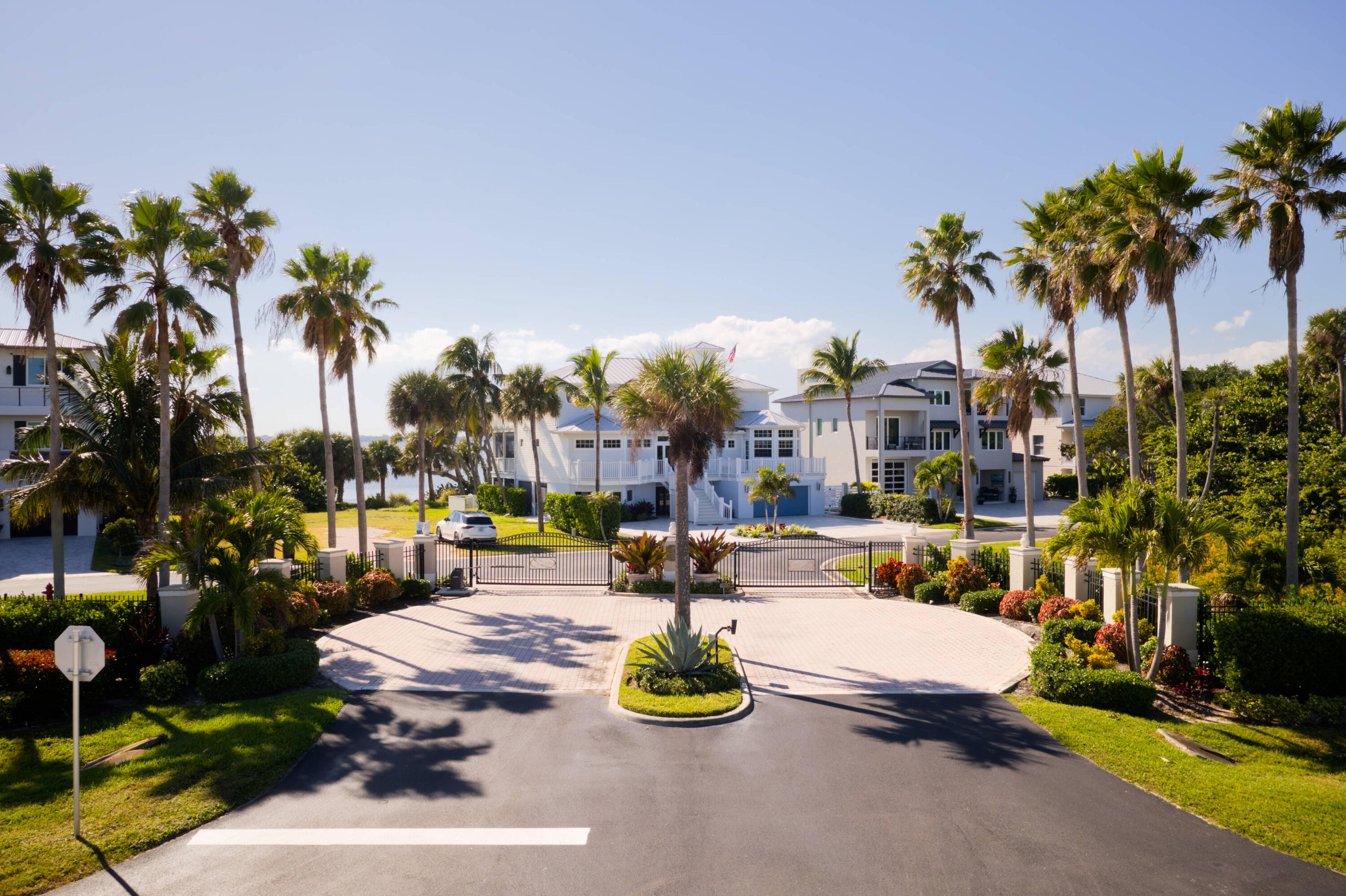 7683 Pelican Pointe Drive Jensen Beach, FL 34957 - Photo 39 of 40 a view of a backyard with plants and a patio