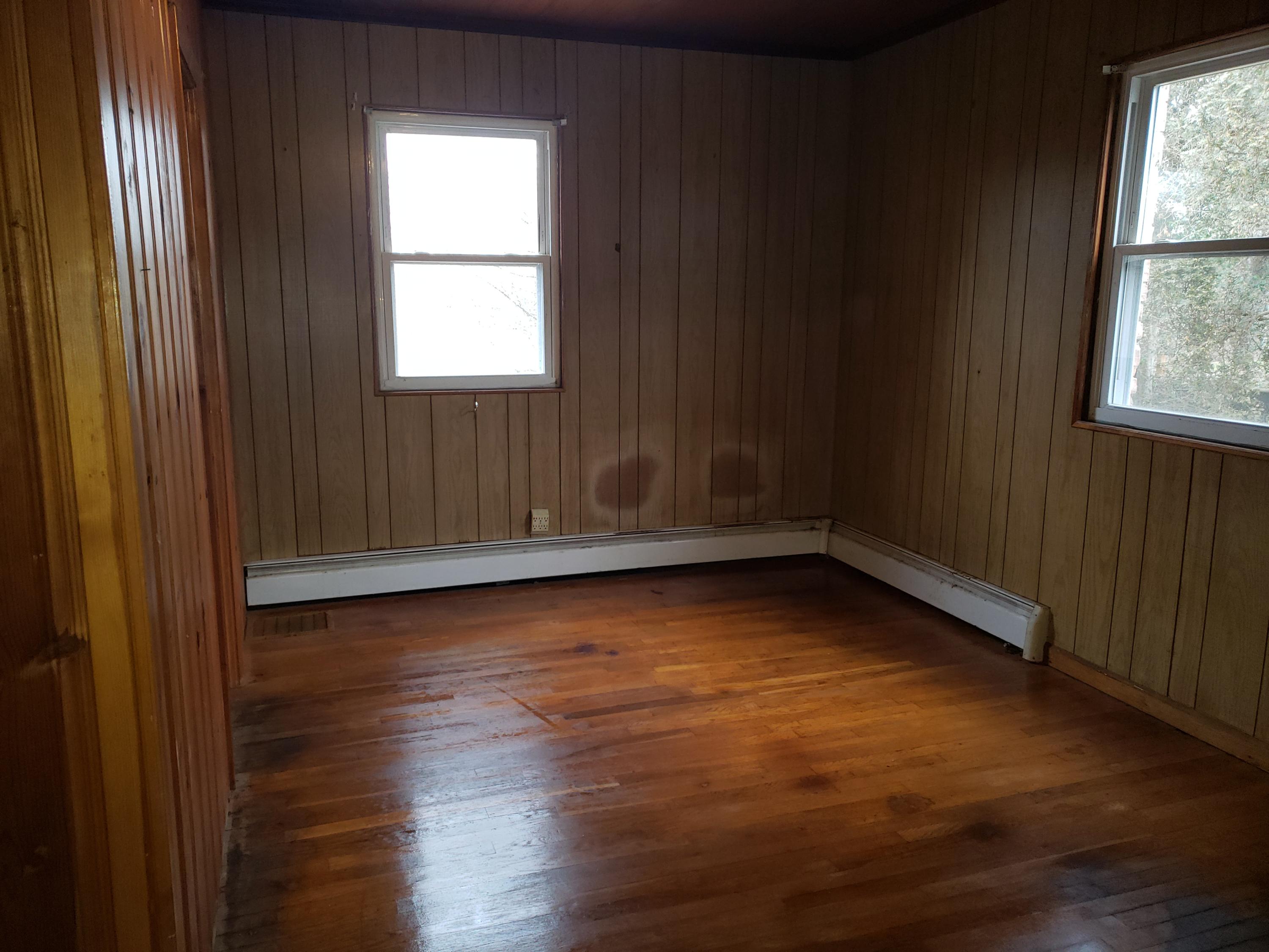 3400 Jae Valley Road Roanoke, VA 24014 - Photo 11 of 15 an empty room with wooden floor and windows
