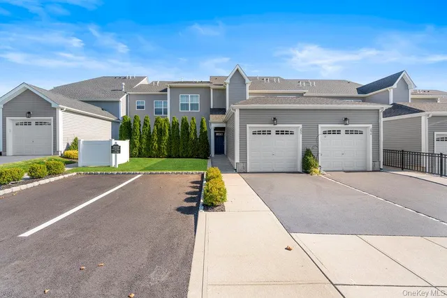 a view of a chairs and table in patio