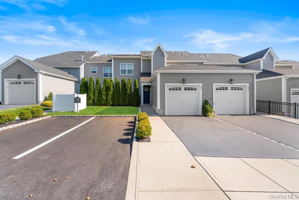 295 Silver Timber Drive Yaphank, NY 11980 - Photo 25 of 50 a view of a building with a street