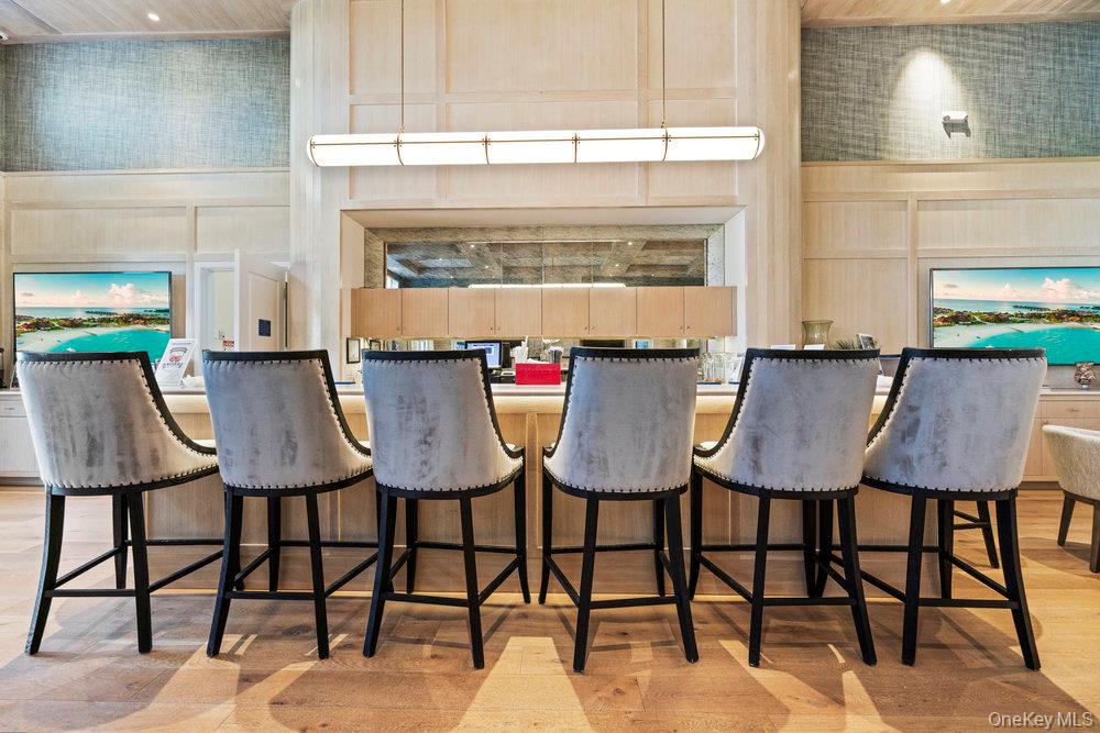 295 Silver Timber Drive Yaphank, NY 11980 - Photo 31 of 50 a view of a chairs and table in a kitchen