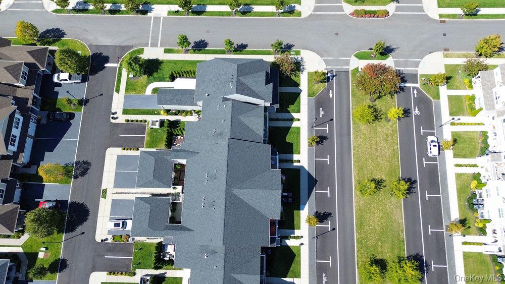 295 Silver Timber Drive Yaphank, NY 11980 - Photo 42 of 50 an aerial view of houses with outdoor space