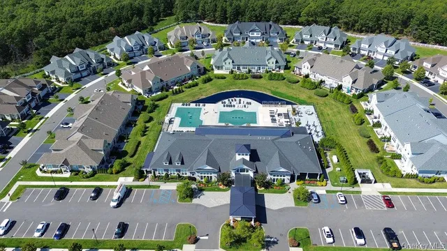 an aerial view of houses with outdoor space